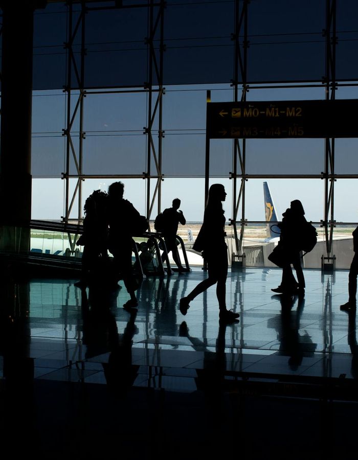 Modern airport terminal with airplane departure